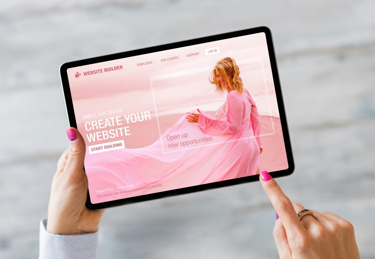 Surfplatta som visar en webbplatsbyggares startsida med rubriken Create your website och en knapp för att börja bygga